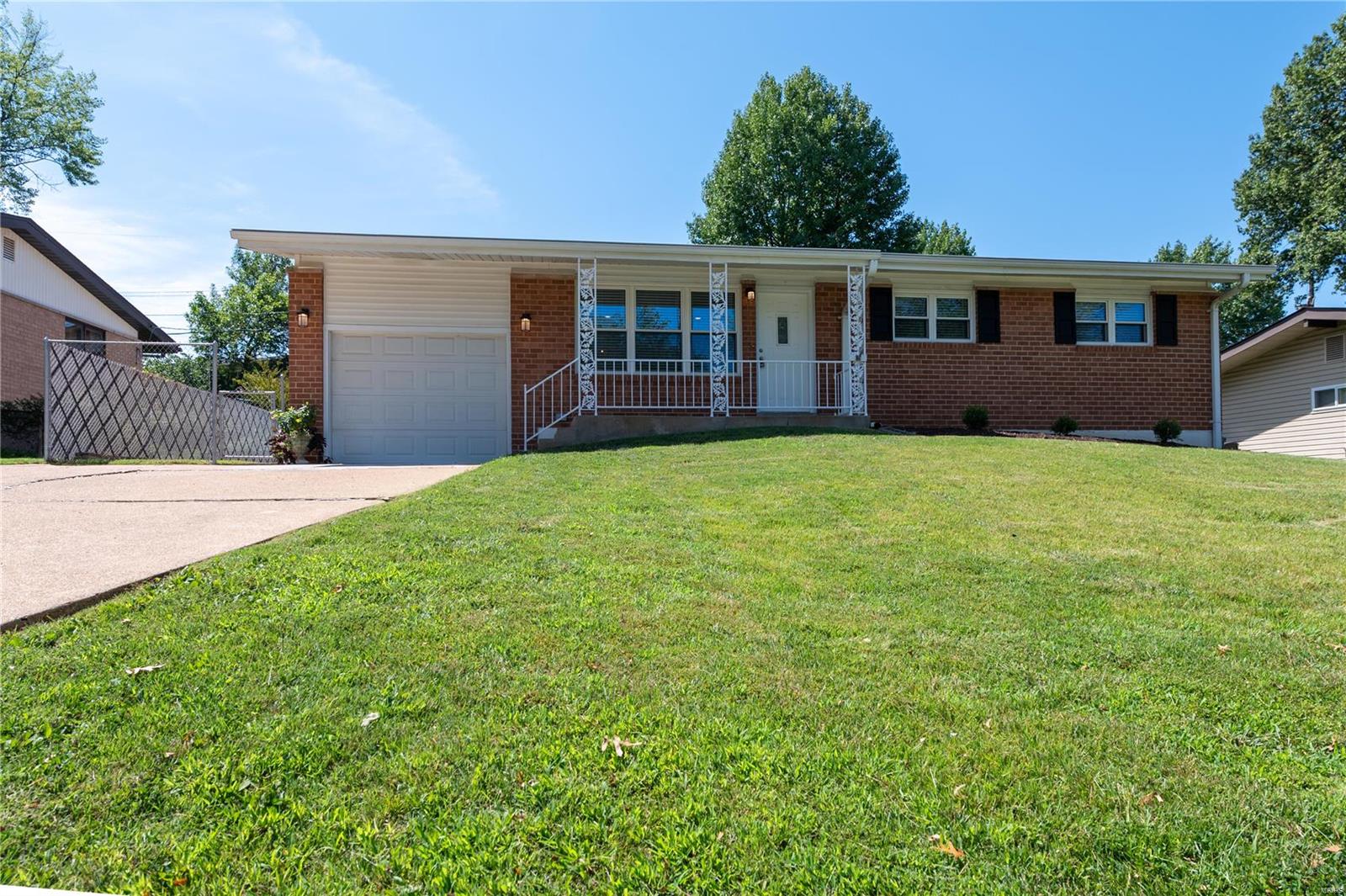 Newly renovated and updated and ready for the new buyer. The home features an all brick exterior and open concept interior with newly engineered hardwood throughout. The stunning kitchen features new cabinetry,granite counter-tops, large center island, all new stainless steel appliances. Main level offers 3 bedrooms and 2 full baths that have been beautifully updated. Bonus for this price range is a large main floor laundry! The lower level offers new carpet in the family room, perfect for entertaining! Private backyard features a covered patio to enjoy with family and friends! This home has so much to offer and is located conveniently near highways (I-255/270 and I-55) as well as lots of shopping!