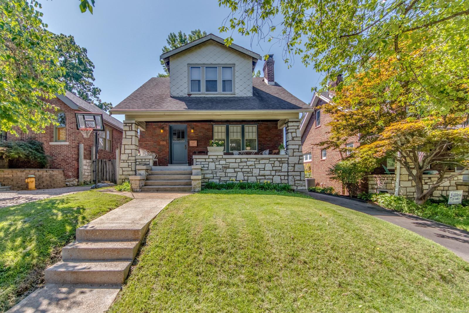 Traditional 1.5 story home in Richmond Heights has a welcoming front porch for you to relax and enjoy your morning cup of coffee, or spend the evening gathering with family. This home has an open floorplan where the living room flows seamlessly into the dining room. Wood floors, stained glass windows, and a wood-burning fireplace, are just a few of the original architectural details which will capture the heart of any buyer. Updated kitchen has butcher block countertops, farmhouse sink, subway tile backsplash, and SS appliances. There are two spacious Bedrooms on the 2nd floor; one has a walk-out to roof top balcony overlooking the backyard, the other - French doors leading to a walk-in closet. Driveway leading to the 2-C garage provides bonus parking spaces. New roof has been contracted, and work to be completed by closing.Please be sensitive to COVID guidelines, and wear a mask.