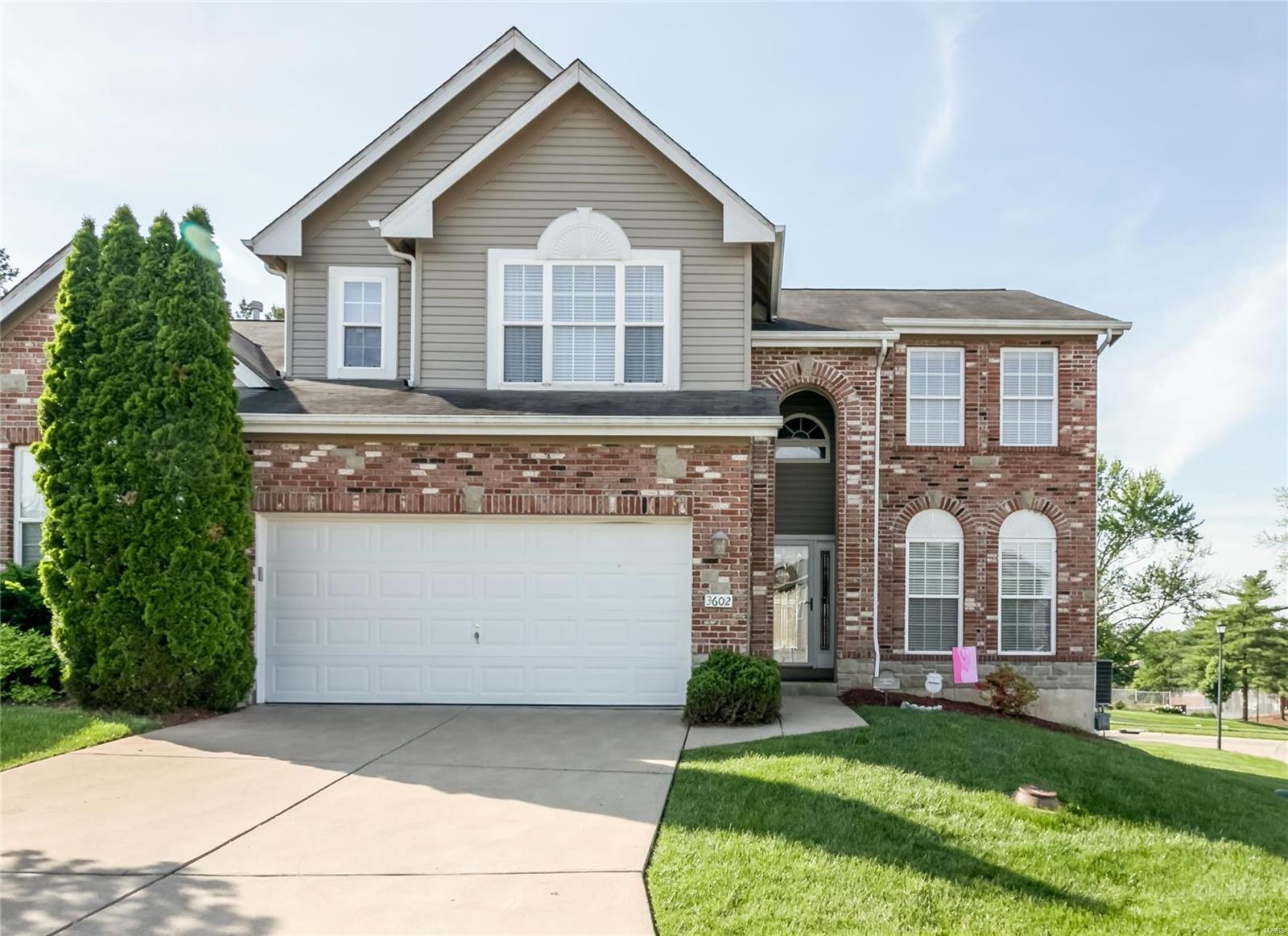 BEAUTIFUL and SPACIOUS, 2492 sqft, 2 story Villa on a corner lot. 9' ceilings on the main floor. Updated kitchen w/42'' maple cabinets, granite countertops, stainless steel appliances, 6' wide center island w/bar overhang. Beautiful hardwood floors throughout the main and second floor (NO CARPETING) Huge bedrooms all w/ huge walk-in closets.  Luxury Master bathroom w/marble tub, separate shower w/marble wall, adult height vanities, 2 sinks, & linen closet. Direct vent gas fireplace w/ upgraded mantel. 6' tall windows in Living room & Dining Room. Lookout foundation w/ two 6'x3' lookout windows & full bath rough-in plumbing. Open floor plan w/ window seat in the staircase. Beautiful upgraded front door & sidelight. Association takes care of grass cutting, Inground sprinkler system, snow removal, and trash.