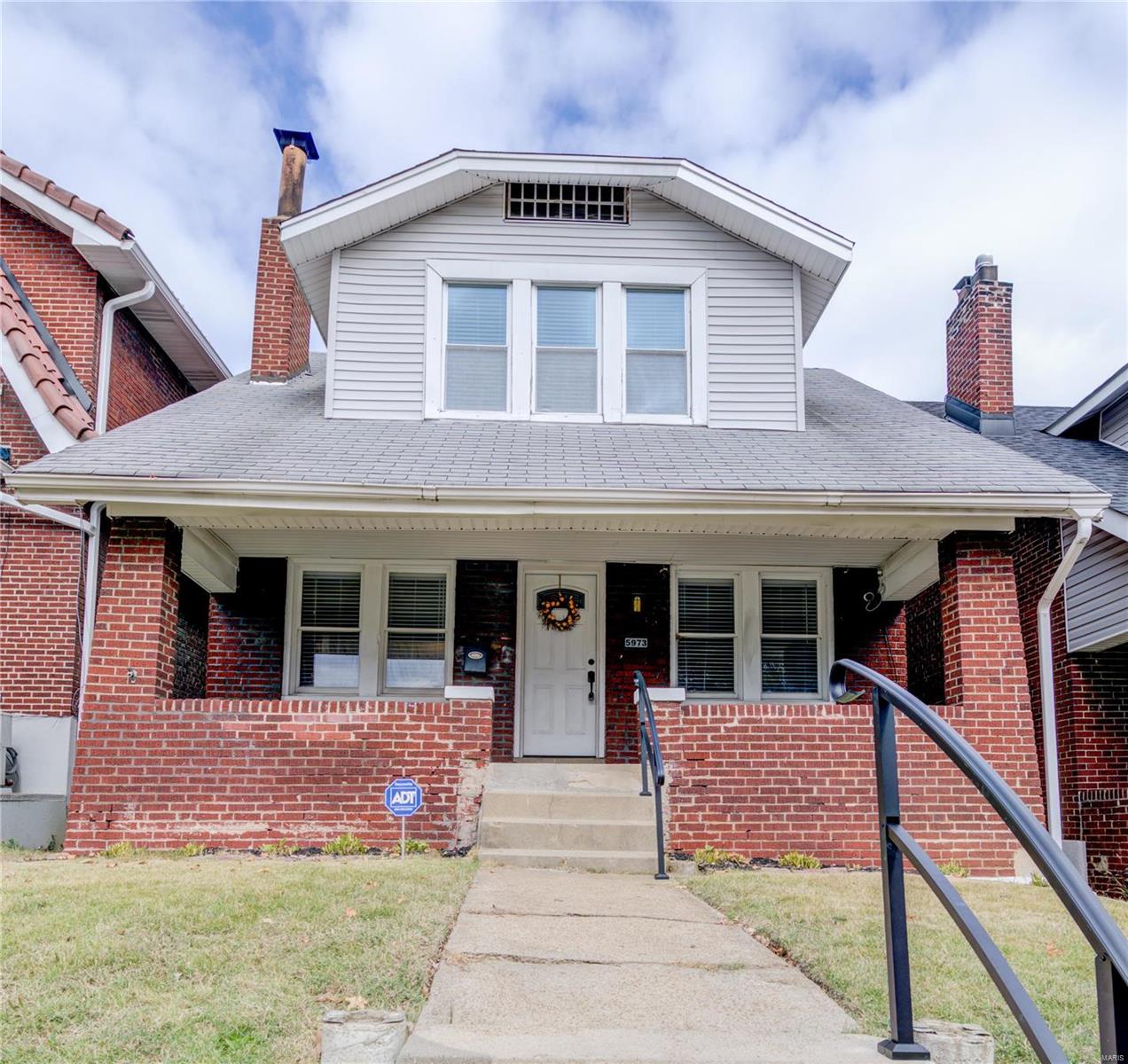Recently renovated 1.5 story home in the heart of the Clifton Heights neighborhood right by The Hill. The oversized rear deck is perfect for entertaining with views of the Central West End & Arch! Beautiful wood floors lead from your living room to spacious dining room. The kitchen area is made for entertaining with a terrific family room bonus rarely seen in homes in this area. The kitchen features granite countertops, stainless steel appliances, & breakfast bar. Recently remodeled half bath completes the first floor. Upstairs an enormous master bedroom with TWO walk-in closets, updated full bath, & additional bedrooms. Walk-out lower level & off-street rear parking. Fantastic location less than 5 minutes to Hwy 40 & 44, Forest Park, & Missouri Botanical Garden. Walking distance to Clifton Heights Park, The Hill, bars and restaurants. Schedule an appointment today!