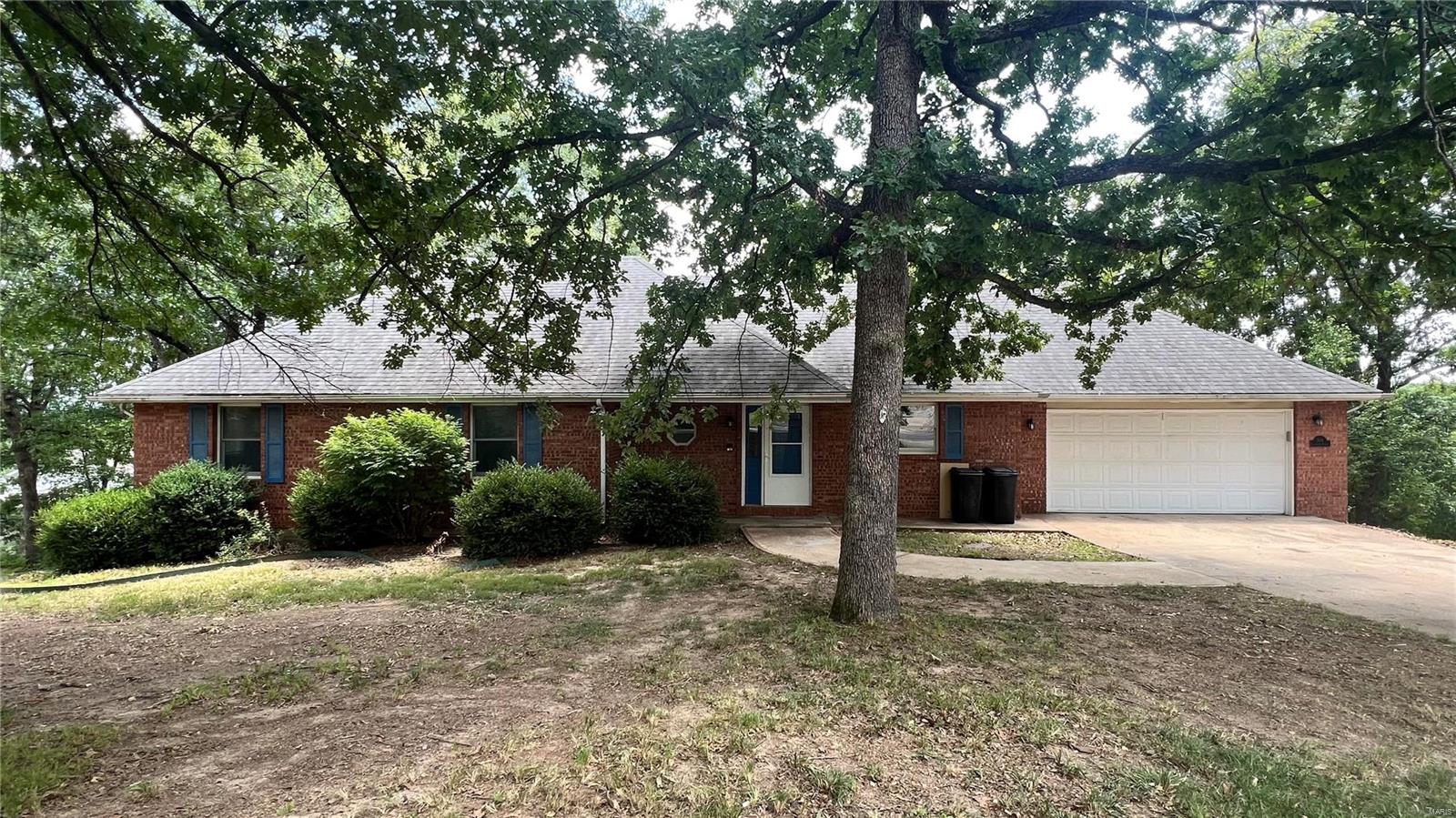 This gorgeous 4 bedroom 3 bath is located minutes outside the west gate of Fort Leonard Wood. Open entering you will notice wood burning fireplace as the center piece of the living room and open dining room and kitchen. The master and two bedrooms are upstairs. The fourth bedroom and bathroom is downstairs along with a good size family room, an office and an additional room that could be used for storage. The lower level allows walk out access to the backyard prefect for entertaining.