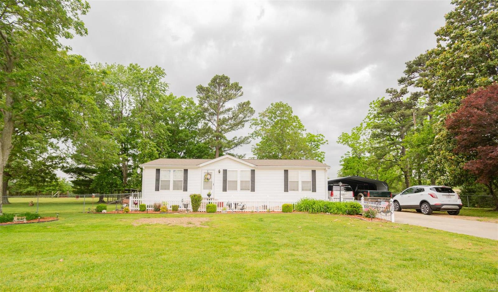 Conveniently located 3 bedroom 2 bath home approximately a mile off Highway 60 with short access to Poplar Bluff, Dexter, and Puxico sitting on 7 acres of land with 2 1/2 acres fenced in!  Storage shed and bonus She Shed located in the beautiful backyard.  You won't want to miss out on this property surrounded by miles and miles of gorgeous farmland!