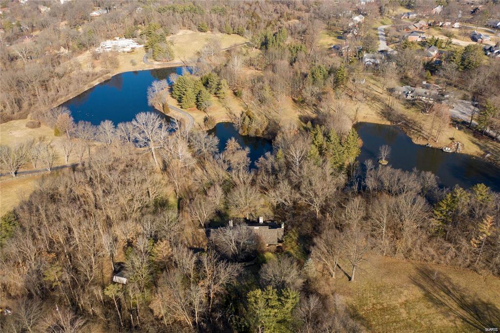 Rare opportunity to build your dream home in Town & Country on 3.12 acres.  Bring your builder and your plan! While walking the property enjoy the company of wild turkeys, ducks, and deer. So secluded and private, you will forget some of the best shopping, dining, and conveniences in West County are just minutes from your door. Less than 5 minutes to Bellerive Country Club to the north, Straub’s to the so., Mercy hospital to the east, and St.Luke’s hospital to the west with a range of private and public schools nearby as well as Maryville University. See it for yourself today!