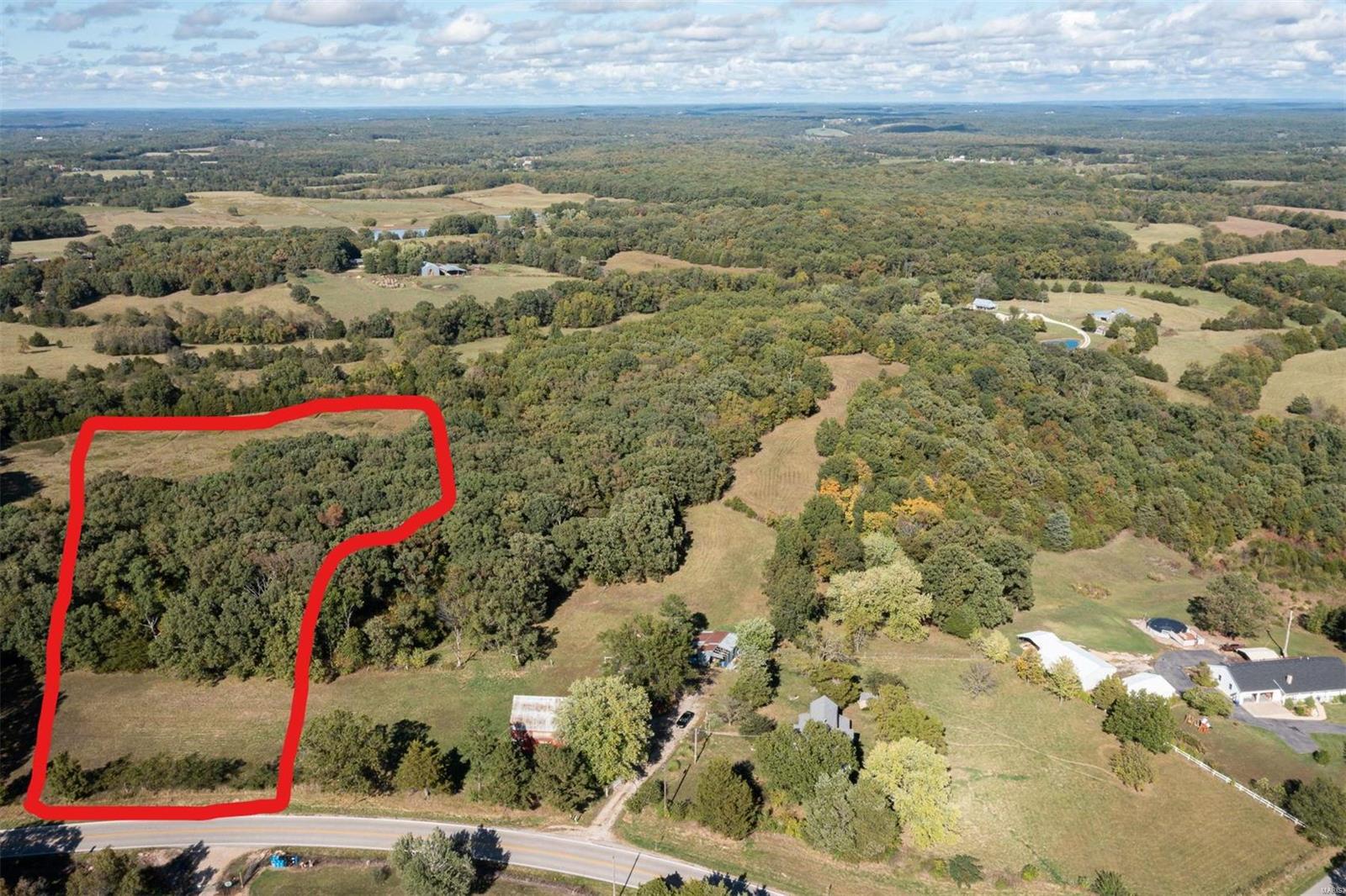 Beautiful UNRESTRICTED acreage that's part open-part wooded. Bring your builder, bring your horses, bring the family...only minutes from elementary school!