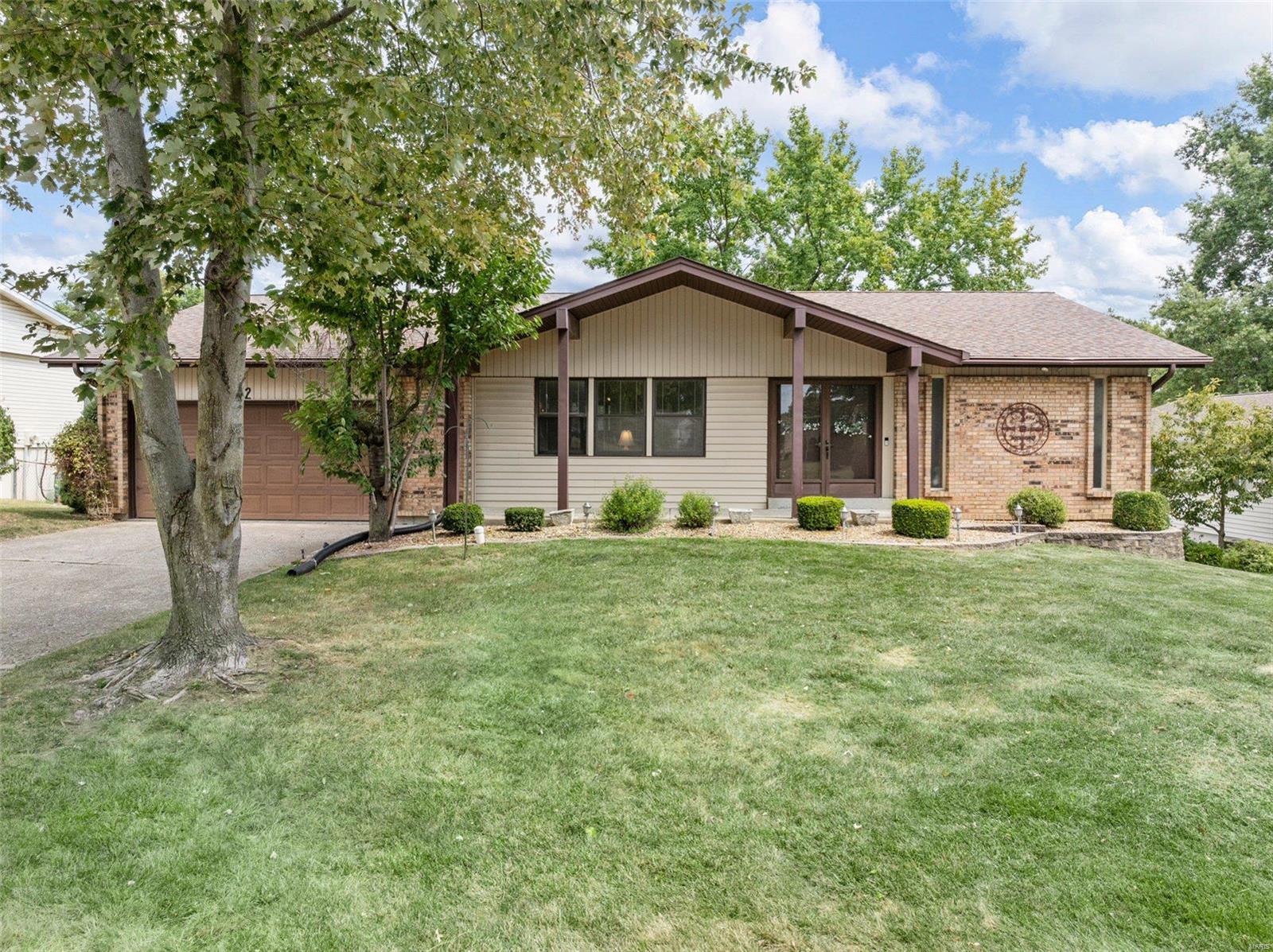 Come check out this large ranch sitting on a great lot backing to mature trees with beautiful landscaping.
Has extra deep 2 car w/possible 3rd car garage tandem on the left side or would make a wonderful workshop area. Large living room as you enter leads to formal dining room. Good sized kitchen with extra space for small table or more cabinets & pantry. Large family room in back with floor to ceiling wood burning Fireplace. Large main floor laundry. Good sized master with dbl closets and full bath w/shower.  2 other nice sized bedrooms w/full hall bath. Partially finished walk out LL with a large rec room with a bar and a started 3rd full bath, and an office room. Large extra walk in closet and nice workshop room also in the LL. Still plenty of storage. Walk leads to a large patio and nice level backyard with some mature trees for privacy.