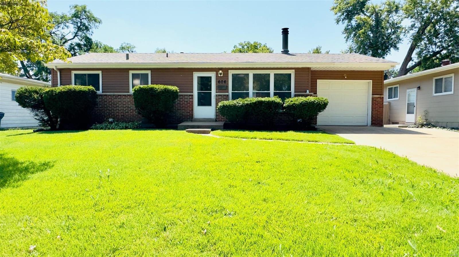 Welcome to this charming 3-bed, 2-bath ranch in Hazelwood nestled on a large level lot. This home has been freshly updated with new paint throughout, enhancing its bright and inviting atmosphere. The kitchen offers custom cabinetry, solid surface countertops, and stainless-steel appliances. Spacious rooms and new flooring throughout main level. The lower level features a beautiful brick, woodburning fireplace in the spacious recreation room, perfect for cozy gatherings, bathroom, and storage area. Enjoy outdoor living on the patio in the private backyard. New roof installed 2021. This well-maintained home is move-in ready!
