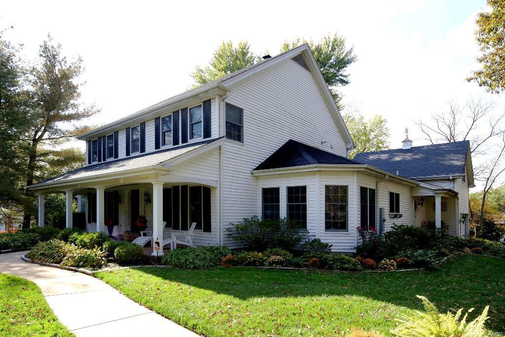 Charming home in Ladue schools within walking distance of Reed Elementary. Kitchen designed by Glen Alspaugh with top-of-the-line appliances, center island, granite counters and custom cabinets opens to breakfast room on one side and family room with built-ins on the other.  Off the family room and above the garage, a newly added office with built in shelving is accessed through a separate staircase. Four bedrooms in all, the master suite is on the main floor with luxury bath, large walk in organized closet and large windows looking out over the private back yard. The remaining 3 bedrooms are upstairs with 2 full baths. Additional features include beautiful refinished hardwood floors on the main level, large 2nd floor laundry room, patio, spacious yard, with extensive landscaping, exterior lighting, sprinkler system, 2 car garage, new driveway & much more.