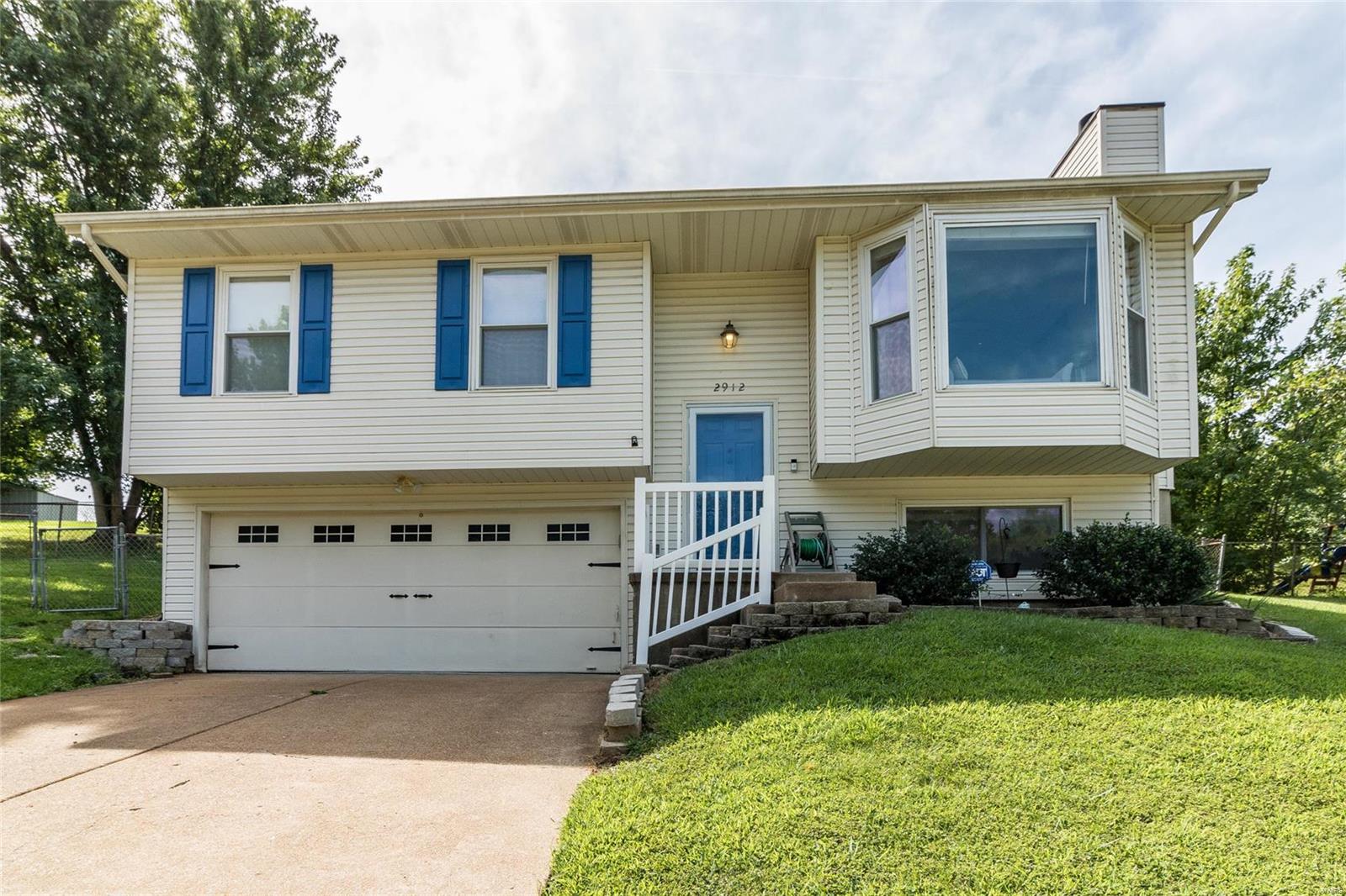 Cute, move in ready home belonging to MOTIVATED SELLERS who are providing a home warranty, the completed home inspection! Home is in great location, close to everything! Features include: Living Room: Large insulated bay window installed in 2019; Kitchen: w/ upgrade cabinets, raised panels & crown molding, garbage disposal, newer (2016) stainless steel microwave, dishwasher, electric stove; Breakfast Room walks out to deck; Large bedrooms, 2 full baths, Newer (2015) wood laminate flooring; Open staircase with spindles; Third bedroom in finished lower level that could be a family/rec room or office, wood burning fireplace with marble surround, ceramic floor tile & full bathroom: Huge deck (20x14); Fully fenced back yard; Oversized 2 car garage with built in storage and opener/keypad entry. ADT system and Ring front doorbell remain with home.