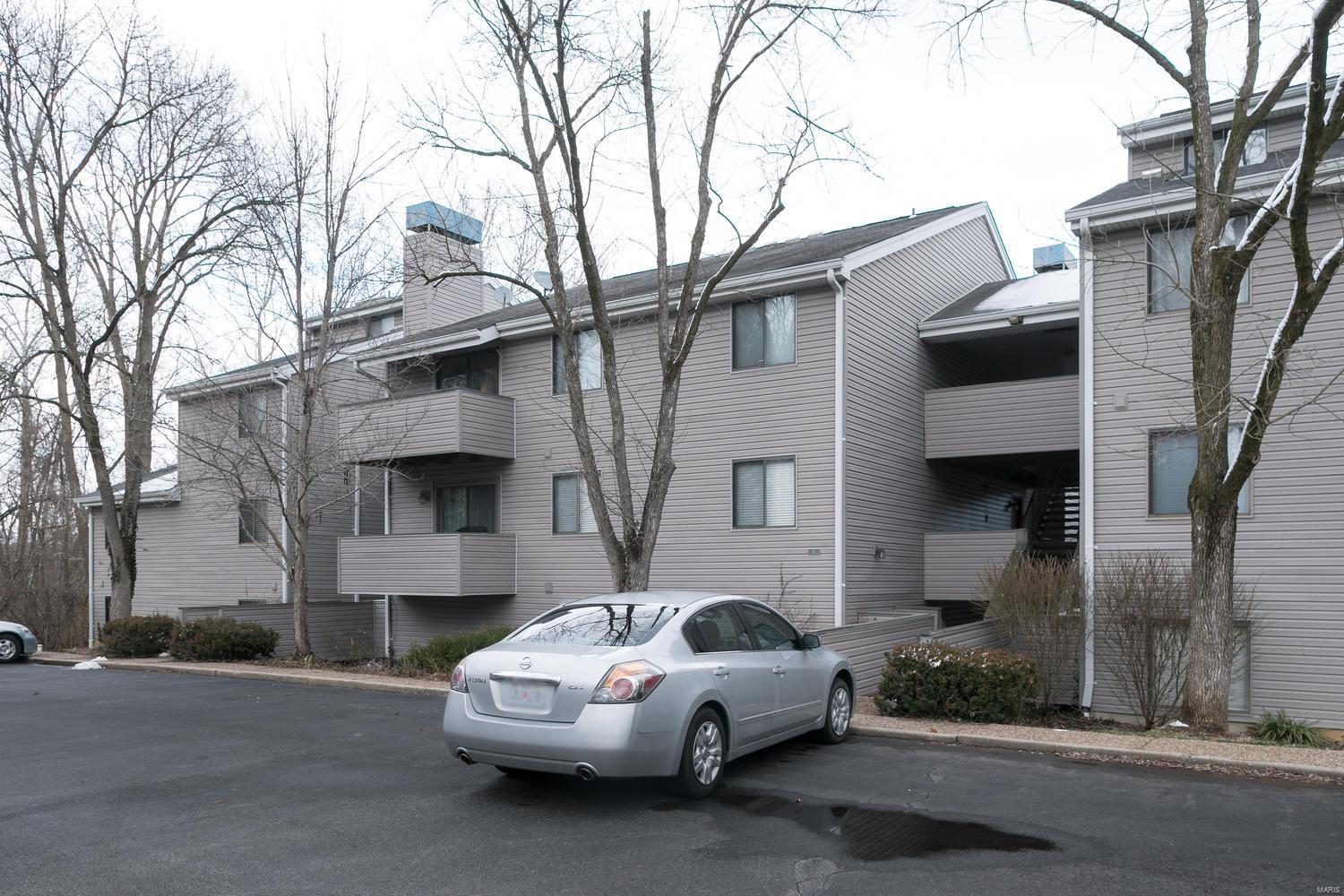 Move right into this immaculate 2 bedroom, 1 bath upper-level unit!  The open floor plan includes a large living room and dining room combination with a woodburning fireplace, vaulted ceiling and sliding doors that open to the balcony which overlooks the wooded common area and swimming pool.  The updated kitchen features new GE stainless appliances including an electric range, built in microwave and refrigerator.  With fresh, neutral paint throughout, new vinyl plank flooring, a new, professionally installed front door, new garbage disposal, new window shades for the bedrooms and a new tub/shower, toilet, exhaust fan and medicine cabinet in the bathroom, this unit is not to be missed.  Laundry in unit. Washer and dryer included in the sale as well as a 1 car assigned, covered parking space and a storage unit.  With easy access to shopping, restaurants and highways and a low monthly condo fee, this unit offers an exceptional opportunity! Location: Suburban, Upper Level