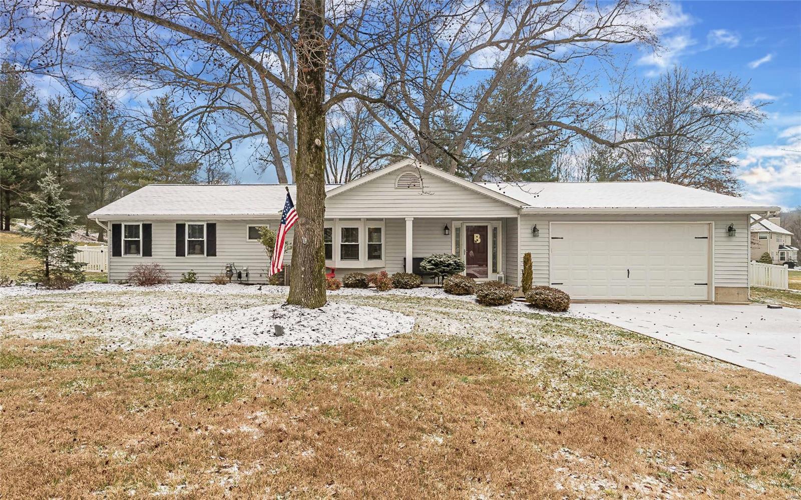 Nestled on nearly an acre in the highly sought after Rockwood School District, this updated ranch is sure to impress! Gleaming laminate floors welcome you home and extend throughout this bright and open floor plan. Flanked by built-ins, the gas fireplace is the gorgeous focal point of the spacious family room, which flows into the dining room and kitchen. Featuring stainless steel appliances, sprawling granite countertops, tile backsplash & convenient pantry, the kitchen is a dream. His & her double closets adorn the generous master bedroom, sharing an updated hall bath with the 2nd guest bedroom! Enjoy the ease of main floor laundry & 1 level living. An extra long driveway and oversized 2 car garage make parking a breeze, & don't miss the fantastic, fenced backyard with 2 story shed for ample storage! Ideal for entertaining, the home has 2 large patios. Great updates throughout including a 10' addition, the garage, driveway, flooring, trim, doors & more!