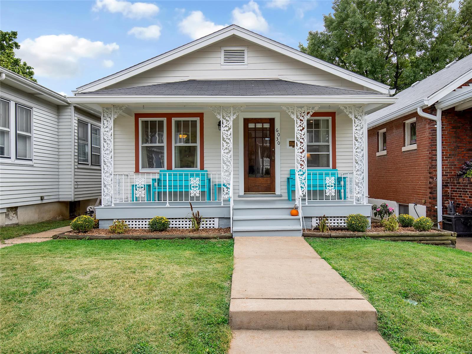 Here's a great opportunity to own in an amazing south city location! The front porch curb appeal is perfect! This 2 bedroom, 1 bathroom home is ready for you to move right in! Come check out the stained glass windows, wood floors, and original stained doors and trim! This house has character and you are going to love it. The kitchen opens to a breakfast room with skylights flooding the room with natural light. The bathroom was recently updated with new tile and fixtures. The lower level is nicely finished allowing more living space and office areas. Two unfinished areas of the basement would make great hobby areas. Step out the back door and you'll be impressed with the composite deck that overlooks the spacious yard. Light a bonfire and invite the friends over! A large carport provides off street parking. Hurry and schedule your showing today!