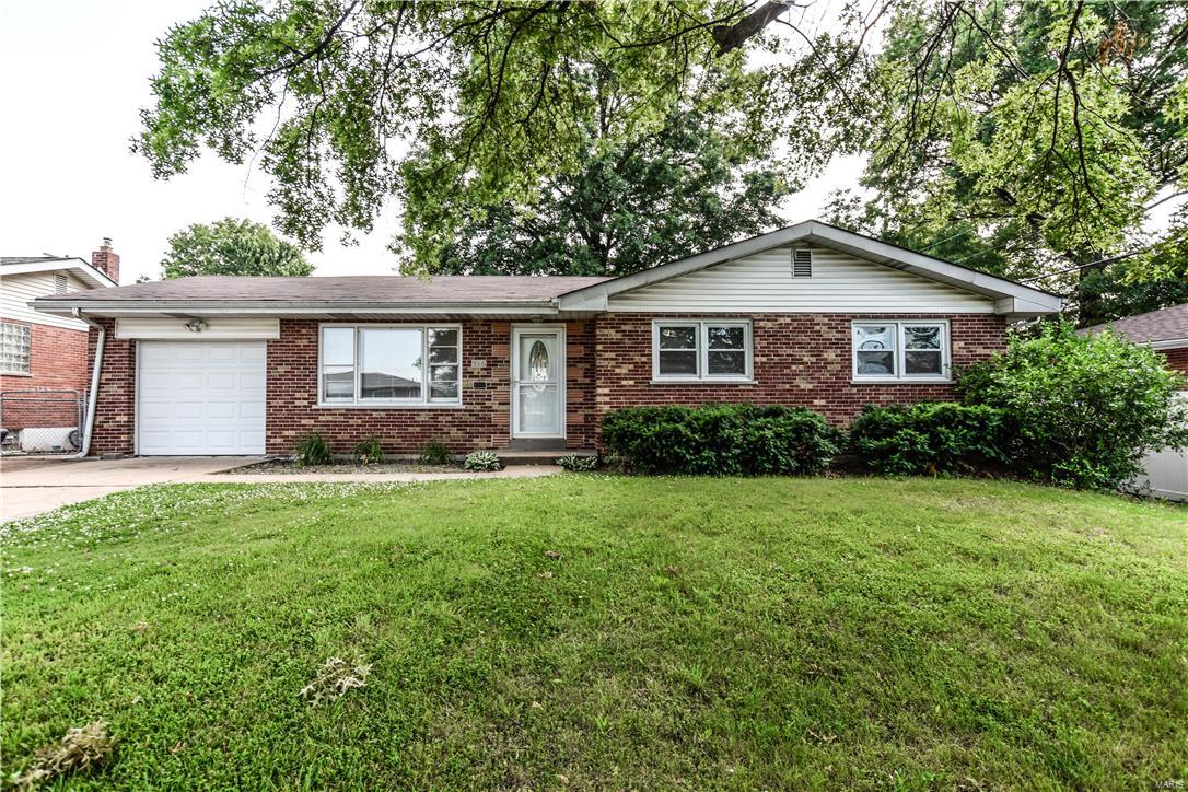 This all brick home has 3 bedrooms, all on the main floor, and wood floors throughout except for tile in the kitchen. The living room is spacious with plenty of room for furniture and for hanging out with family and friends, and the large windows give lots of natural light in the living room and dining room. The dining room opens onto a large deck overlooking the backyard; there is also a patio off the deck. The lower level has a large finished family room, a full bathroom, and a finished room that can be used for an office, craft room, you name it. Fridge will stay. Roof is only 3 years old.