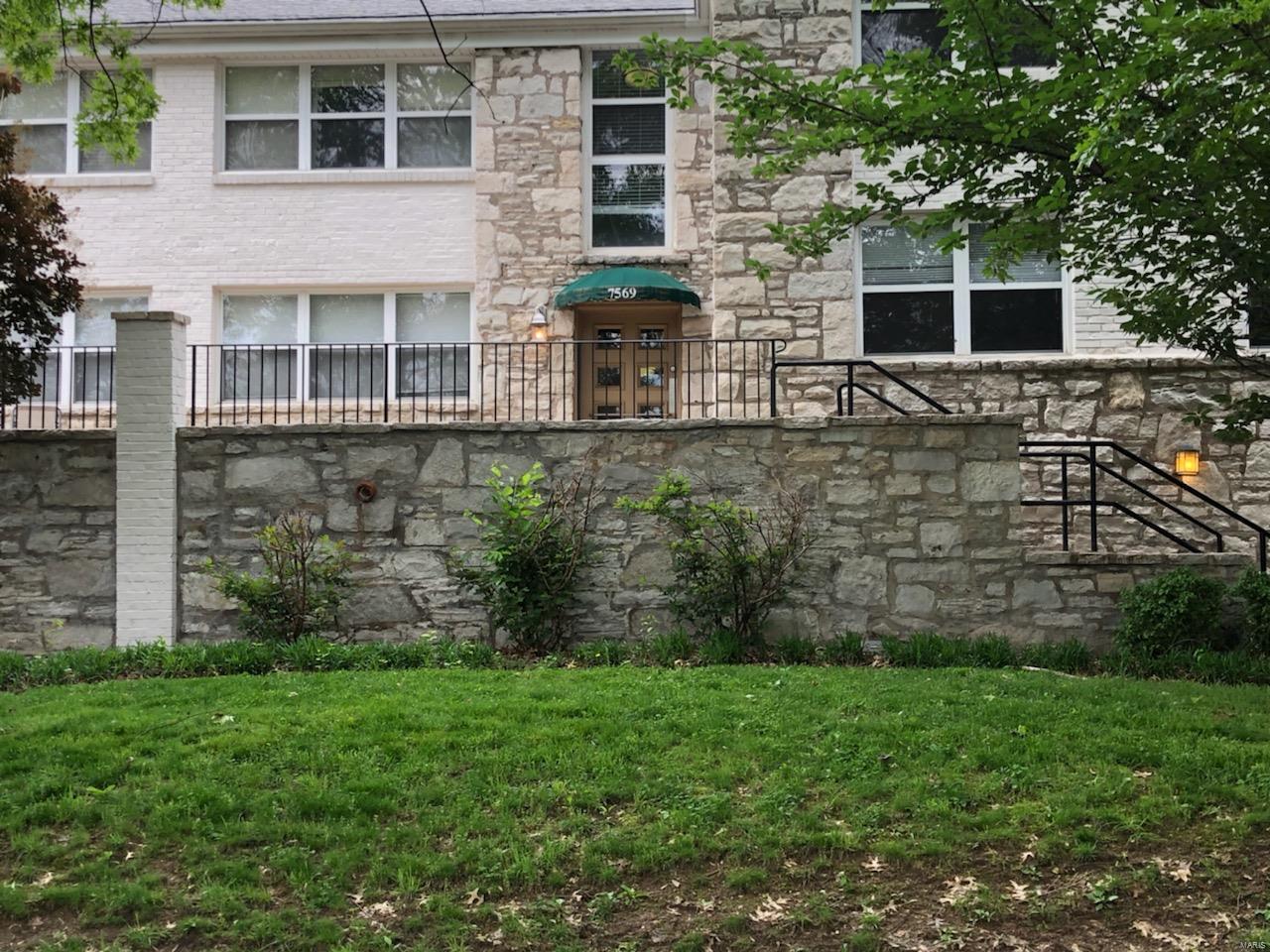 NEW PRICE! GREAT VALUE!  Charming condo in the coveted Moorlands neighborhood! The open floor plan lends itself to simple & comfortable living. Wall-to-wall windows in the living room & bedroom let the natural light shine in. The kitchen has maple cabinetry, granite counters & stainless steel appliances, including a new electric range. The unit has wood floors, generous closets, in-unit stackable washer/dryer & jetted tub with handsome tile surround. The tuck under garage is temperature controlled with one assigned parking space & storage locker. This easy to maintain unit is located in a quiet & pet friendly building, just steps from Starbucks and neighborhood restaurants. Convenient to downtown Clayton, universities & parks. Great opportunity for students, young professionals, part-time residents or anyone wanting to live in Clayton.  Pet friendly and quiet building! Location: Ground Level