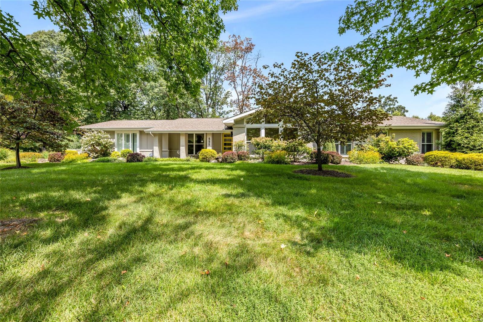 Outstanding 5-bedroom, 4.5-bathroom sprawling ranch on an acre lot in Frontenac.  This freshly updated home features over 4400 sq ft of living space.  The center entry hall entry opens to a formal living room w/ faulted ceilings, stone fireplace and beautiful wall of windows and the formal dining room.  The updated kitchen features custom cabinetry, designer appliances, stunning stone countertops and huge center island that opens to the great room with more vaulted ceilings, 2nd fireplace and a 2nd dining area.  The primary suite features a large bathroom w/ double vanity and tub with separate shower and large walk-in closet w/ custom built ins. The other wing of the house features 3-more bedrooms, 2-full updated bathrooms and main floor laundry area. All of this, plus another flex-room that is perfect for a home office or guest suite with a 4th full bath right next to it. The lower level provides even more finished space with a walk out, huge rec-room and bar area.