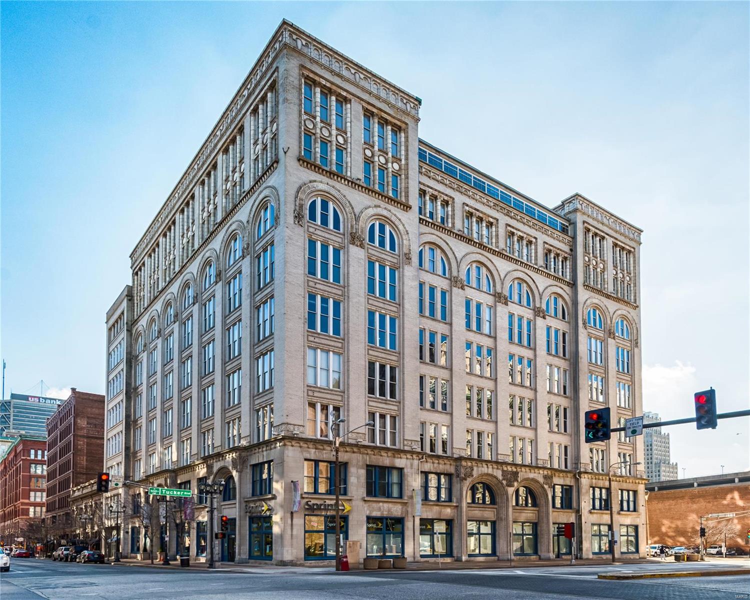 Corner Penthouse level loft with brilliant light and sweeping panoramic views of Downtown Saint Louis! Floor-to-ceiling large windows and exposed duct-work provide the ultimate downtown loft experience you have been looking for! This one of a kind loft offers 2,222 sq/ft with 2 beds and 2 full baths. Start your morning right with gorgeous views of the city in this updated kitchen with cherry cabinetry and frosted  doors, granite countertops and breakfast bar island. Opens to spacious dining and living area, ideal for hosting a dinner or cocktail party with friends. Spacious master suite with walk in closet features french doors that overlook the courtyard. The spiral staircase that leads to a private rooftop deck is a dream! Includes private washer and dryer, stainless steel appliances, and tandem parking in basement garage. This airy penthouse with flooding light is steps away from restaurants, bars, entertainment, and public transportation! Location: Downtown