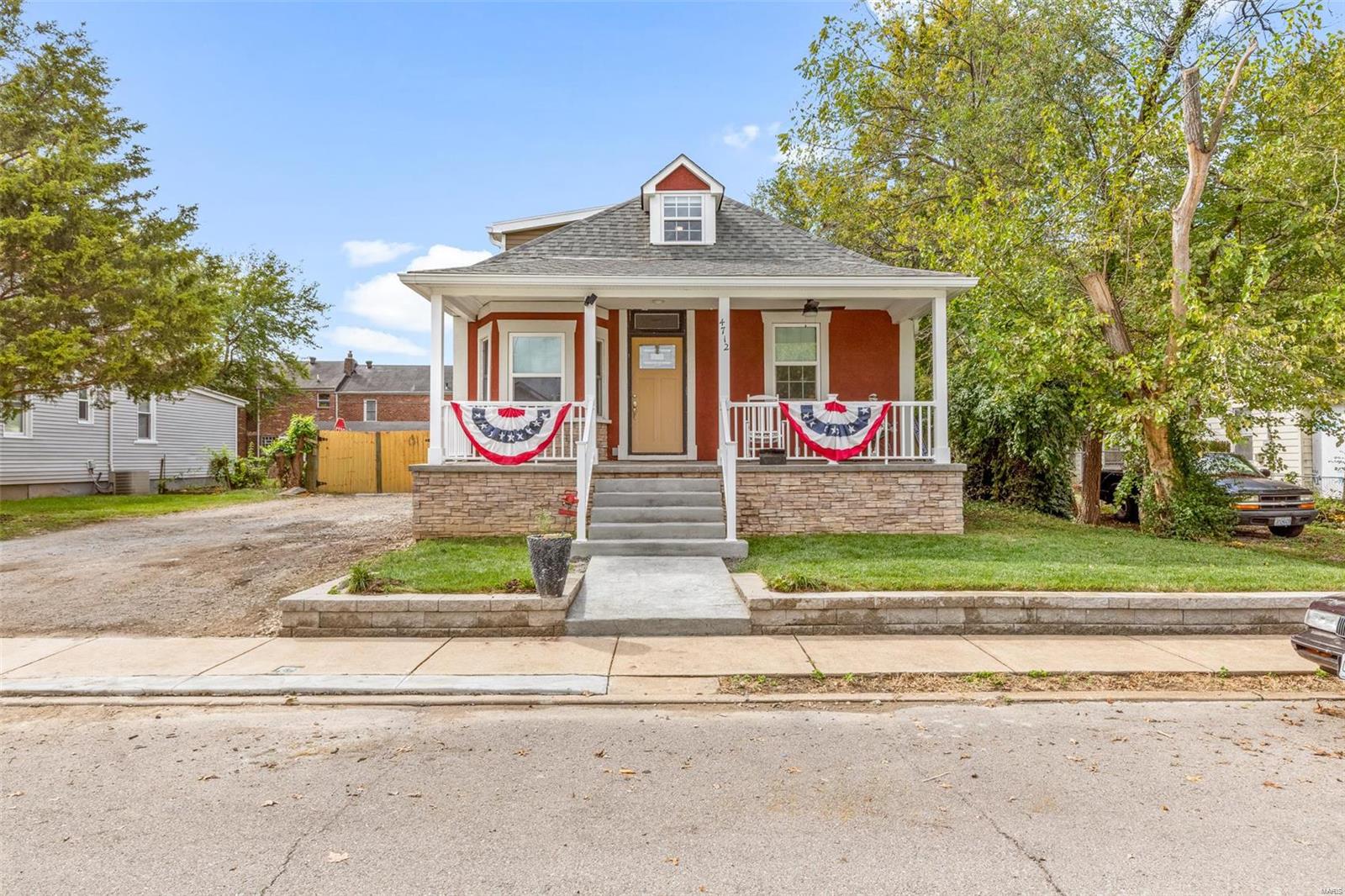 Turn Key Masterpiece awaiting YOU! Wonderful curb appeal & covered front porch are just the beginning. Brand new roof, gutters, siding, windows, HVAC, electric, plumbing.. it's like a New Home full of charm & character! Beautifully renovated, open floor plan with stunning hardwood floors throughout. You cannot miss the craftsman details throughout: tile work, crown molding, & unique accents just to name a few. Great room features bay window & plenty of space for dining table. Living room boasts brick accent wall & electric fireplace. Kitchen displays custom cabinetry, built-in wine rack, deep SS sink, breakfast bar, & SS appliances. Spacious main floor bedroom with accent brick wall & full en-suite. Guest half bath and mud room round out the main floor. Up the elegant staircase you'll find the exquisite owner's story, complete with custom-built en-suite. Back patio features stamped concrete & a hot tub! Fully fenced yard & massive 6-car driveway. Open House 10/10 1-3pm. Additional Rooms: Mud Room
