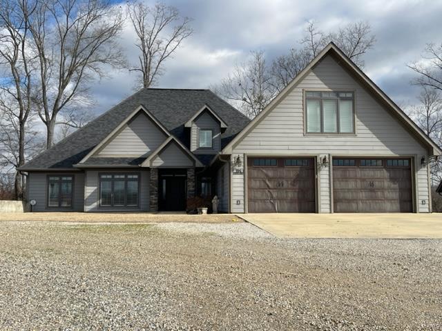 Are you looking for a custom-built, 1.5-story home with river views?  This three-bedroom, three-and-one-half-bathroom home has all the features you would want in a river home.  This home offers an open floor plan with 3599 sq. ft. that includes hardwood flooring, a beautiful kitchen with custom cabinets, a spacious island, granite countertops, and stainless steel appliances.  The two-story family room features oak beams, a commanding staircase, and a gorgeous two-story stone fireplace.   A wall of French doors gives you fantastic river views and easy access.  The main level primary suite has its river view, an en-suite bathroom that boasts double vanities, a makeup area, and a large custom-tiled walk-in shower.   The property also includes a 36' x 70' Morton outbuilding with a kitchen and bathrooms.

Adjoining 30+/- acres is optional for an additional purchase.

Interested parties must provide proof of funds or a bank letter of credit.