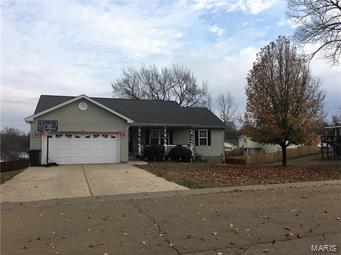 Adorable 3 Bedroom 3 Bath Ranch home with partially finished walkout Basement in Central R3 School District. 2 Car attached Garage with Storage Area.  Open Floor Plan, Custom Cabinetry,  Kitchen/Dining Combo, Entry Foyer.  Some Hardwood Floors.  Main Floor Master Bedroom Suite with Walkin Closet and Full bath.  Main Floor Laundry, Deck off Main Level overlooking Above Ground Swimming Pool with 1 year old liner, with its own Wrap around Deck.  Partially Finished Walkout Basement with Full Bath in Lower Level.  Family Room and Rec Room.  Large Storage Area.  Freshly Stained Privacy Fence around back of home.   New Roof in 2015.  50 Gallon Water Heater.  Keyless Entry.  Schedule an appointment to confirm, this is in fact, the home you have been looking for!
