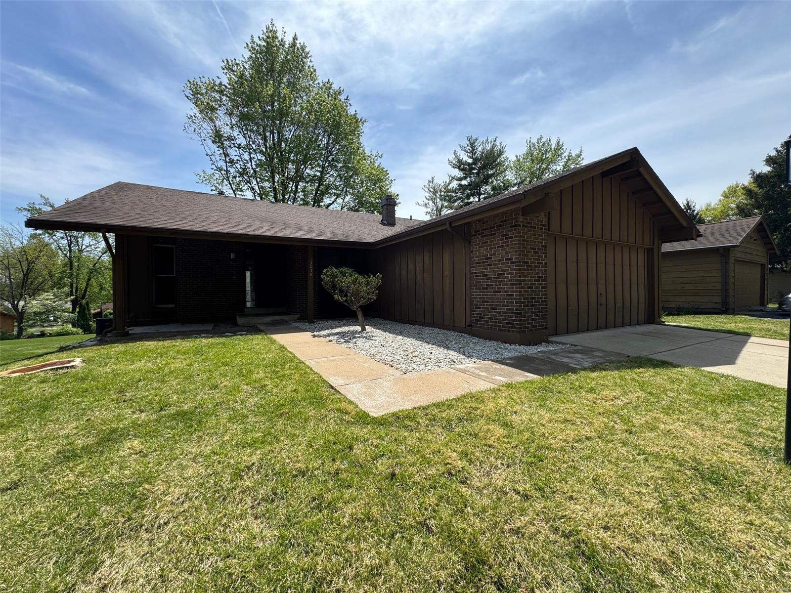 Welcome to this contemporary ranch, awaiting your personal touch to transform it into your dream home. Embrace the potential for modernization with a new kitchen and flooring, promising to elevate its appeal to new heights. Cherished by a single family since its inception, this home radiates warmth and care. Recent updates include a Trane HVAC system, water heater, driveway, sidewalks and roof. Step inside to discover vaulted ceilings gracing the living, dining rooms, and den (can be converted to a 3rd main level bedroom)l, providing spacious ambiance. Huge kitchen presents ample room for cabinetry, a generous island, and a breakfast area, promising both functionality and style. Lower level features a convenient walk-out and abundant natural light filtering through numerous windows.Outside, the level backyard is perfect for summertime gatherings and outdoor activities. Ideally situated in Parkway School district minutes from Creve Coeur Park/Lake, shopping destinations, and highways.