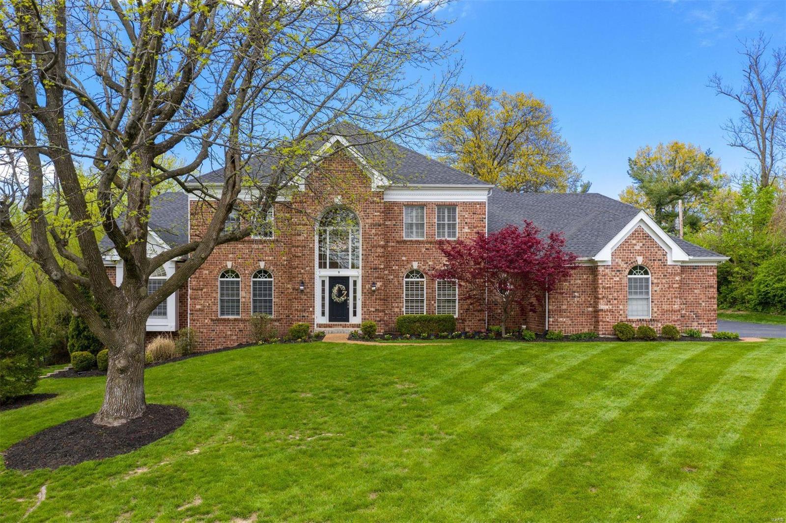 Stunning Executive Custom Home on 1.25 park-like acres in a central location. The minute you walk through the front door, you will fall in love with the light-filled two-story entry with an elegant curved staircase. The great room offers a wet bar, fireplace, and two stories of windows that overlook the expansive backyard. The masterful chef's kitchen includes Viking and Sub-Zero appliances, butler's pantry, a center island that overlooks the hearth room, a beautiful stone fireplace, and expansive windows. The elegant dining room includes a tray ceiling and beautiful crown molding that is carried throughout the main floor. The main floor master suite has a beautifully updated bathroom with a steam shower. The upper level offers three en-suite bedrooms and an additional bonus room. Lower level offers fabulous entertainment space, third fireplace, and a walk-out to the beautiful backyard. Wait no longer, this elegant home has it all! Additional Rooms: Mud Room