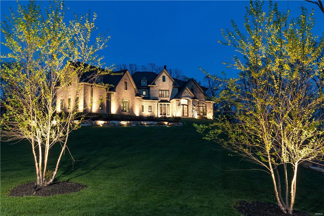 A truly special home perched atop 3 rolling acres with view of lake-one of the only long standing private roads still rich with the "Country" character from days long before the "Town" transformed this municipality into predominantly 1 acre lots. Only 1.5 yr "new", this custom home is fully loaded with primo finishes/amenities -a perfect balance of unassuming functionality yet boasting a chic ambience unmatched by others in contention. Exquisite kitchen equipped to the 9's, open to eat-in, great room, pool and veranda. Tastefully appointed DR & LR with bar complete the main entertaining areas. Fab master suite, office, laundry & 1/2 bath complete the main. 4 additional bdrms/4 baths on 2nd floor -massive 4th ensuite bdrm with vaulted ceiling makes great media/rec room or possible Au Pair quarters. Rock surround saltwater pool/spa, extraordinary covered outdoor veranda w/ fireplace, oversized 4 car garage and more. A slice of "Country" located minutes from all the city has to offer!