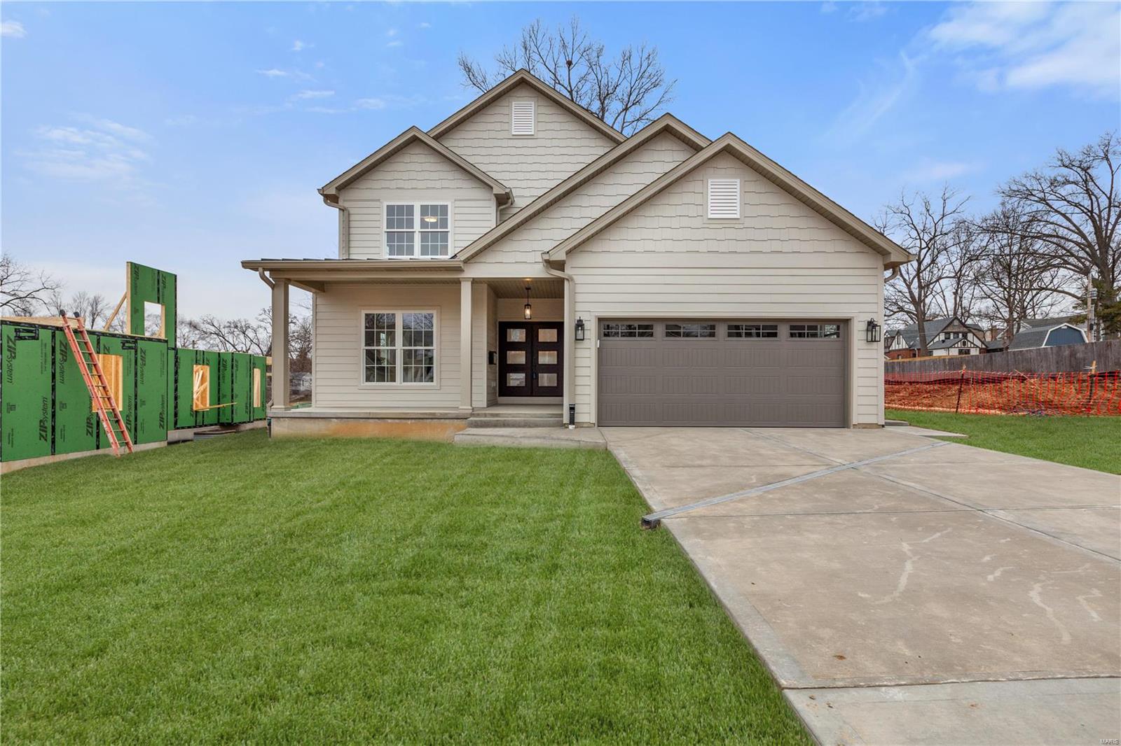 Take advantage of this excellent opportunity to live in this brand new build home on level lot surrounded by other new and completed homes and several others currently being built. This stunning 2 story new home boasts over 3,700 sq ft of living space with 5 bedrooms , 4.5 baths including 900 sq ft in the finished lower level, an open floor plan, Stainless Kitchen appliances, commercial gas range, beverage refrigerator, hardwood floors trough out, an en-suite bedroom with own private bathroom, luxury primary suite on the 2nd floor and Jack and Jil's bedrooms with uniquely designed shared bathroom. 
Exterior includes LP SmartSide, expert finish trim and siding, partial metal roofing and architectural shingles, covered back porch, and electric car charger outlet in the garage. 
Top rated Kirkwood schools, very close proximity to old Kirkwood downtown, Farmers market, restaurants, parks, shopping. Additional Rooms: Mud Room