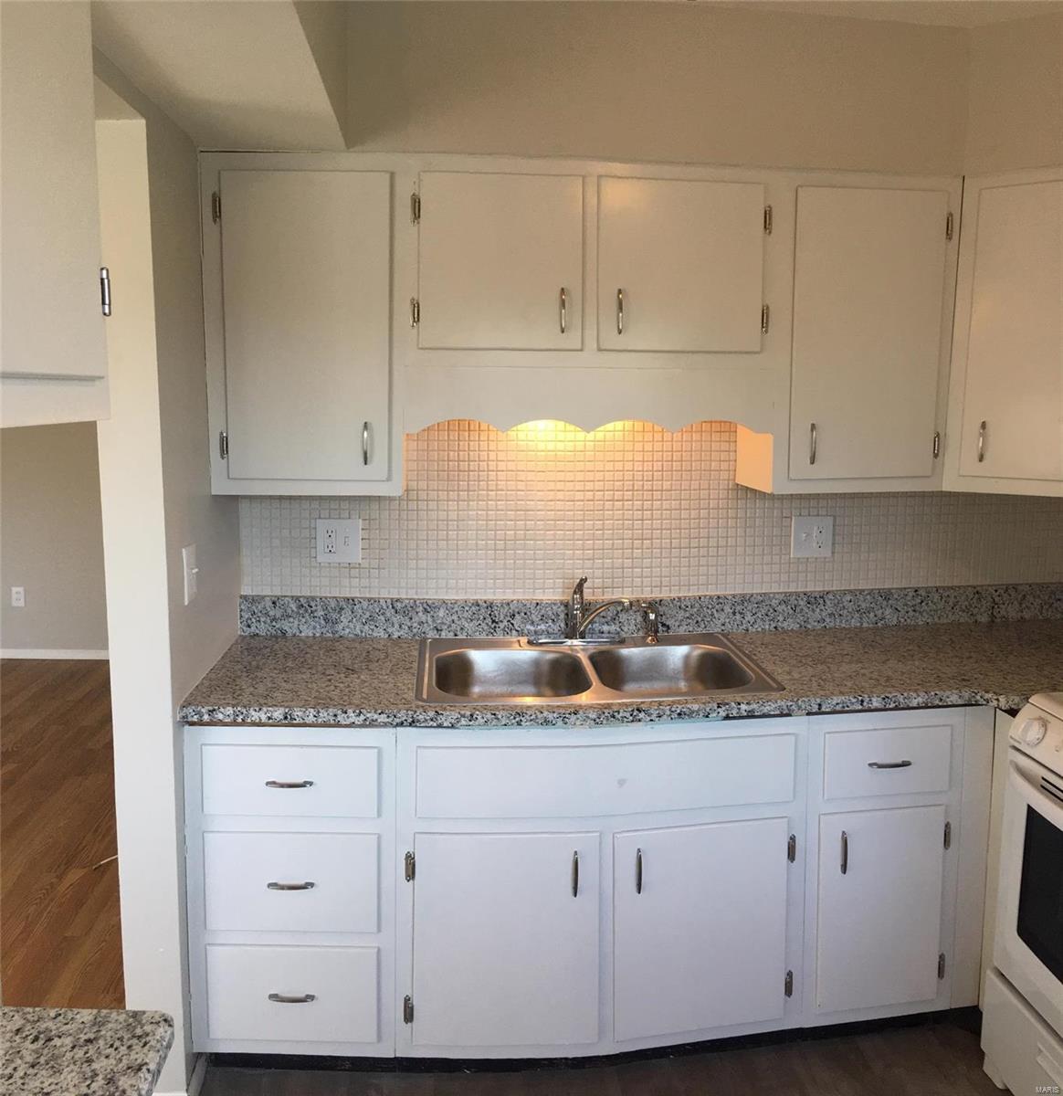 Very motivated seller!  Make an offer....Beautiful one bed one bath condo on the ground floor that is ready for you. Your kitchen has a brand new stove, refrigerator, granite counter tops,  newly painted cabinets,as well as new flooring. It also has an eat in bar for your convenience. Large living room, which is also freshly painted has newer laminate flooring, new six panel hallway closet doors, and a beautiful view of your courtyard. Bathroom has new toilet and cabinet. as well as a new marble vanity.  Large bedroom has ample closet space as well as a walkout to your private , peaceful patio, which is perfect for entertaining! Your location near 270/Dunn Rd. is near shopping, dining, and recreation.  This updated gem is just waiting for you!! Why rent when you can own for about  one half of a monthly rental! Location: Other
