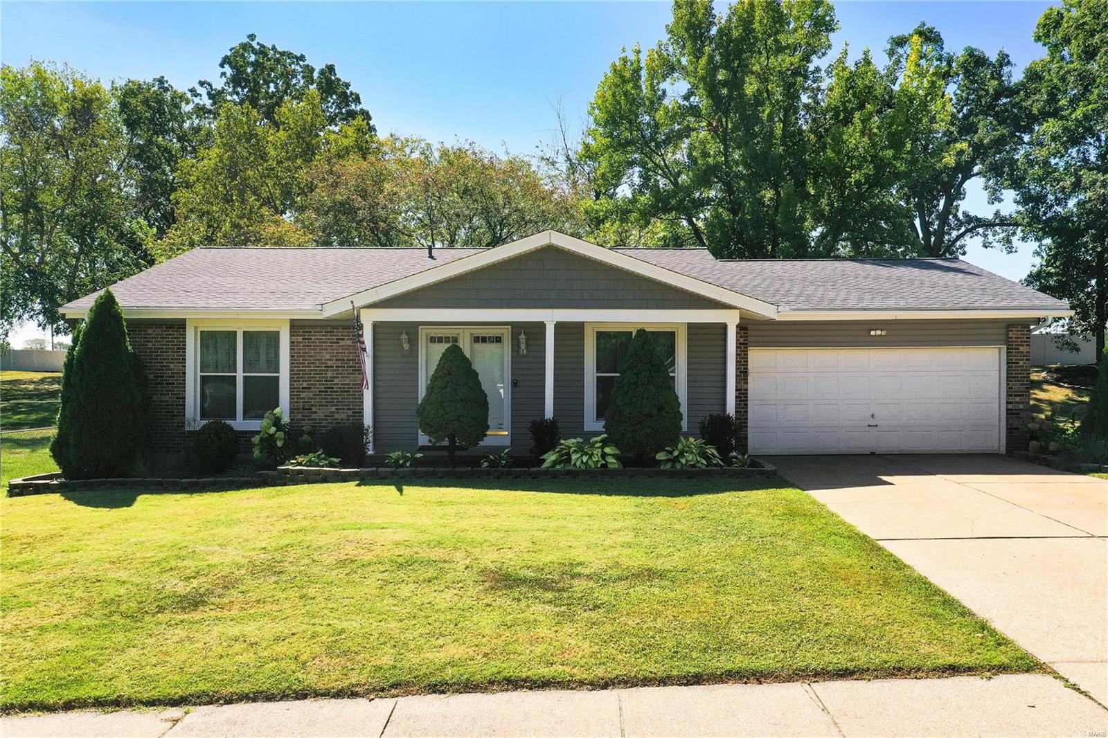 This charming 3-Bedroom, 2-bath home nestled in a peaceful setting (with no neighbors behind), is a meticulously maintained gem offering privacy and comfort. The open-concept hearth/family room flows effortlessly into the kitchen and opens to a spacious 12' x 18' covered patio—perfect for outdoor entertaining. The large primary bedroom features plantation shutters for added privacy and a large walk-in closet. The basement finish was started, with the plans for an additional sleeping room and theater room…just needs your final touches. The 25' extra-deep garage provides ample parking for those oversize vehicles or workshop area, while the 8' x 10' shed is ideal for all your outdoor gear. Conveniently located with easy access to Highway 70, this home also boasts a new roof & gutters. Plus, the fridge, washer & dryer are all negotiable! Don’t miss this opportunity to own a beautiful home in a centrally located area of St. Charles County. Agent is related to seller.
