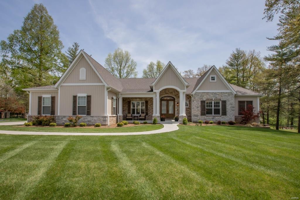 Exquisite ranch home built by award-winning, custom home builder, Bob Berkley, situated on a nearly 1 acre lot in the sought after Bellecoeur Subdivision! 4 Bds/4.5 Bths & 4500+ sqft of living space w/walkout LL! Main Floor boasts Study w/French doors, walk-in closet & pocket door to Jack-n-Jill Bth; separate formal Dining Rm, lovely Powder Rm, as well as a vaulted Great Rm w/floor to ceiling stone FP w/wood mantle. Gourmet Kitchen, that is a chef’s dream, custom cabinets, top-tier granite, commercial-grade SS appliances, huge center island/breakfast bar, a spacious pantry & adjoining Breakfast Rm w/door to patio. Other highlights include: gorgeous hardwood floors on both levels, wiring for speakers in almost every room, crown molding & tall baseboards throughout, central vac, professional landscaping & outdoor lighting, custom window treatments, security system & oversized 3-car garage, just to name a few! Additional Rooms: Mud Room