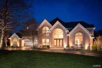 Words like 'Elegant", built like they "built homes 100 years ago" & couldn't replace it at this price...come to mind when describing this young home w/an old world feel. Walk thru the leaded glass front door to find an expansive foyer w/sweeping grand staircase. Look thru to the Great Room with/a bay wall of windows offering a long view of the golf course vista, beautiful pool w/new heater, pool bath, spa w/waterfall, & new paver patio seating area. All come together to form the perfect home for entertaining family & friends.New Inspire roof in 2015.Library features an 18' ceiling, 11' tall wall of custom built-in shelving & double French doors. Kitchen is a cook's dream w/newer kitchen appliances. Even the laundry room is amazing w/built-in sewing machine. Master Suite features a private fireplace, pool access, marble floored master bath, huge custom finished closet, & a wow factor. Finished LL, Elan sound system, solid wood doors, extensive crown molding (most 24").Gorgeous!