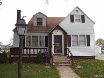 This BEAUTIFUL, HISTORIC home is a must see! Tons of space and so much to offer: the fireplace in the living, built in bookcases in the study, large kitchen w/lots of cabinets, full basement, detached 2 car garage,  4 bedrooms, 2 full baths and the list goes on. The wood floors in the dining and living room were recently refinished and the wood floor and ceramic in the family room were installed last fall. Lovely crown molding in the living room, dining room and study. The furnace, AC, water heater and dishwasher were all replaced in 2012. This home is priced to sell so do not delay, call for your appointment today!
