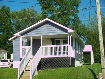 Nicely remodeled interior including new bath & beautiful kitchen! You'll love the open kitchen/dining area/living room!  In addition to bath & kitchen remodel (with all appliances to convey), these items were new in 2016:  all new windows on main floor and basement, roof replaced, large covered front porch added, new plumbing, electrical work, paint & floor coverings!  Very large enclosed back porch offers possibility of 3rd bedroom, if Buyer wants to finish it.  Handy carport in rear and driveway is easily accessible.  You need to look at it!