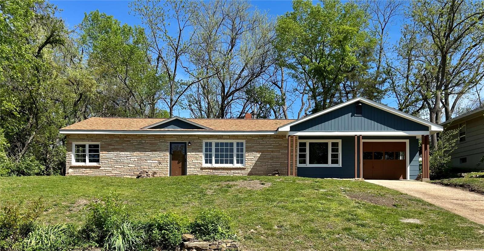 Call to schedule your private showing today!! Completely Remodeled 3-bedroom 1.5-bathroom home in the heart of Rolla. New electric panel and meter. New Golden Select laminate flooring. Front load washer & dryer. Stainless steel appliances. Butcher block counter tops. New interior & exterior paint. New LED light fixtures. New bathroom & plumbing fixtures. Newer roof. One car attached garage. French drain system in the front and back of the house for drainage. Large patio surrounded by landscaping in the back yard.