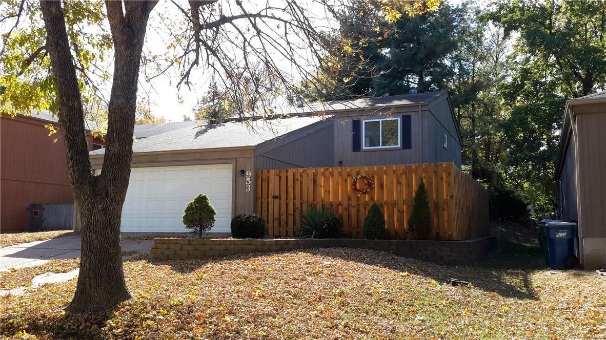 Welcome Home!  Private setting nestled amongst the trees yet located in the heart of everything.  This home features 3bdrms,2bths, vaulted great rm w/wood burning fireplace open to the updated kitchen w/breakfast bar.   The lower level is great for entertaining w/walk-out to private patio.  The sellers have already done many updates:  Hardwood floors, freshly painted, opened wall from kitchen to great rm and installed breakfast bar, stained exterior, new fencing, and the list goes on!  The subdivision also has a club house w/pool, tennis, playground.  Call for your tour today!