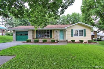 Two bonus rooms in basement currently used as bedrooms. Large open living room. Dining room with French doors. extra large family room in basement. Hardwood floors recently refinished.