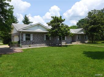 Full brick home featuring many updates including newer flooring, paint, counter tops and much more. 2 bedrooms, 2 full baths, living room, den/dinning room and an eat in kitchen make up the main level. Full, finished walk out basement with a 3rd bedroom, bathroom and an expansive family room. Other features include a new high efficiency gas furnace, on demand generator, and central vac. This home also boasts a great outdoor space with a covered rear porch overlooking the 1.15 acre shaded lot, 24x24  detached garage, great garden spot and lots of parking. This home is in a great location and is a must see! Additional Rooms: Mud Room
