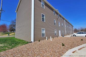 Location! Location! Location! Investment Opportunity next to SEMO Campus perfect college housing. 15 unit apartment complex built in 2013. All units are 2 bedrooms, 2 baths. Each unit includes washer and dryer. Current rent is $800 per unit. Low maintenance and nice newer units, great opportunity to buy an investment with little maintenance and easy upkeep. Current Annual Rental Income is $144,000. Owner pays water/sewer/trash and tenant is responsible for all other utilities.