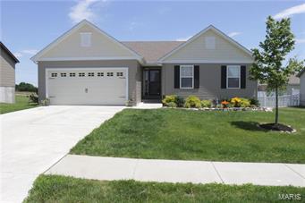Why wait for new construction. This 3 bedroom, 2 full bath ranch home is only two years old. Many upgrades, including all hardwood flooring throughout, insulated and drywalled garage, an extra garage window, ceiling fans in every room, some faux wood blinds, some of the basement has been framed for finishing, basement has egress window, and rough in for bath. They have installed a beautiful 14 x 20 deck with decorative railings. The master bath has double sinks. Master bedroom closet and guest bedroom closet have professional organizers. The laundry area is conveniently located in the hallway near the bedrooms. The front and backyard have been professionally landscaped. No neighbors looking in your back windows, the home backs to an early childhood center.