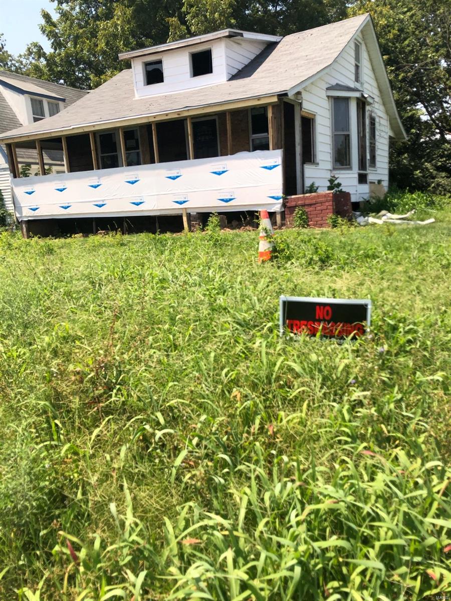Investors bring your plans and add a great asset to your portfolio. Nice 2 bedroom home ready for rehab and is perfect for the improvement savvy homeowner or investor. Great location! This is an AS-IS sale. Seller to do no inspections or make any repairs. No warranties expressed, implied or provided. No utilities, bring a flashlight. A new roof, some windows and a new door have already been installed this year. Buyer to verify all info including schools, zoning, utilities, etc.