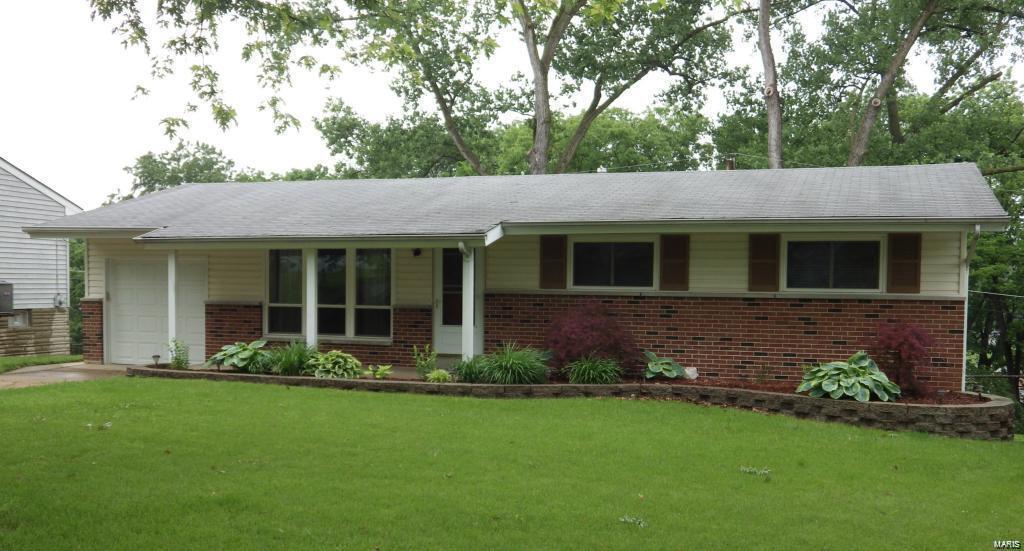 The home has 3 bedrooms, 1&½ baths & finished lower level, the perfect family area. It has a large family room & two additional rooms that are used for family recreation. The rooms can also provide office space or possible future bedroom. The main level of the home has newer insulated windows & carpet. All bedrooms & dining area have ceiling fans. The updated kitchen & dining area will make meal time more enjoyable for you and your family. The maple cabinets are beautiful. Dining area walks out to a large deck (12X24) that overlooks a huge fenced backyard.