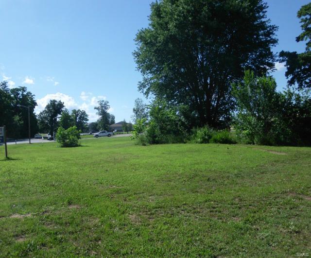 Few lots available in Farmington with this great of a location.  High traffic area.  Lot spans almost to the corner of Walton Drive - Just over an acre of land - Fabulous commercial possibilities. Location: High Traffic