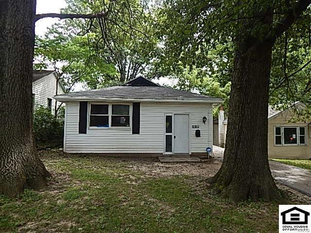 Bungalow Home Featuring: 2 Bedrooms, 1 Bathroom, A Deck and Patio in the Fenced Backyard, And Much More! HUD Homes are Sold As Is.