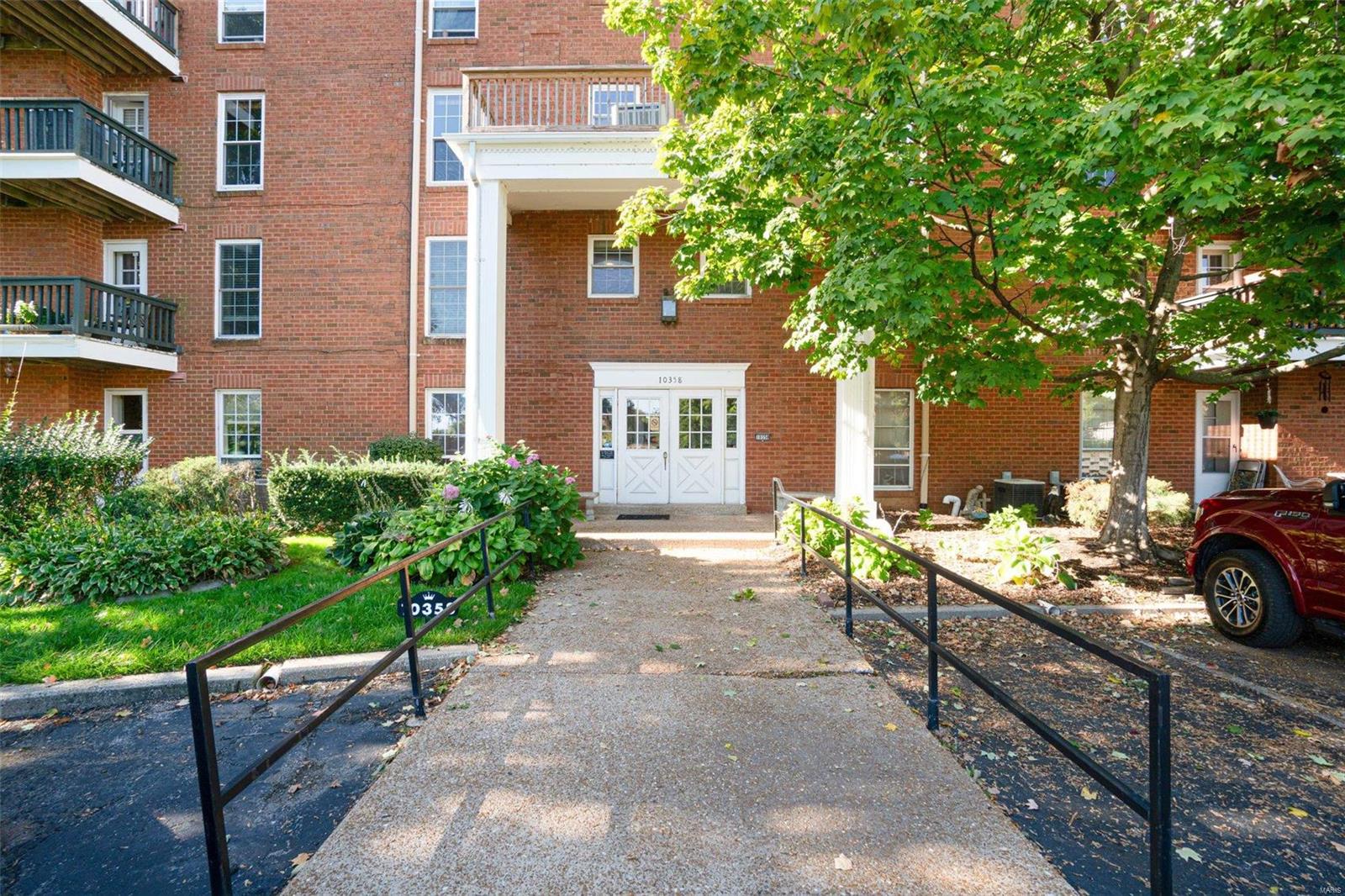 This charming, main level condo will not disappoint with over 1,200 sq/ft of updated living space. Step inside and be greeted with trendy laminate floors and neutral paint throughout. The living room hosts a fireplace and doors that lead to the courtyard with mature trees and landscaping. The kitchen features updated shaker cabinets, hard surface countertops and a gas stove. The master bedroom suite has lots of closet space and a full, updated bathroom. The secondary bedroom has adequate closet space and shares the updated, guest bathroom. In unit laundry can be found off the hallway; washer and dryer to stay. Secure parking in the underground garage and access to Lindbergh, Page, Olive, I-64, I-70, I-270. Near restaurants, shopping and across from JCC. Pet friendly but view restrictions. Location: Ground Level