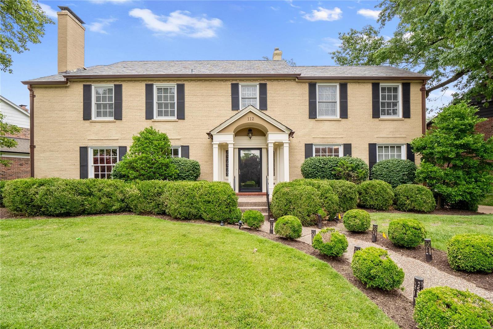 Nestled within the esteemed Lake Forest Community & sought after Clayton School District. Over 3,700 sqft of crafted living space, open floor plan seamlessly connects the various areas including the gourmet kitchen adorned with an expansive island and top-of-the-line Viking appliances. Enjoy your 4-season room with heated floors and a stamped concrete patio. Spacious formal living and dining areas, complete with a cozy fireplace. The primary suite provides a luxurious retreat, featuring a soaking tub, separate shower, and custom closets. Upstairs, discover a bedroom with an ensuite bath, along with two additional bedrooms sharing a Jack & Jill bath. The finished third floor offers space ideal for an office, media room, or play area. Finished basement with fireplace and wet bar. Desirable features, including second-floor laundry, crown molding, hardwood floors throughout, copper gutters, a slate roof, updated lighting, and custom closets, all contribute to its exceptional curb appeal.