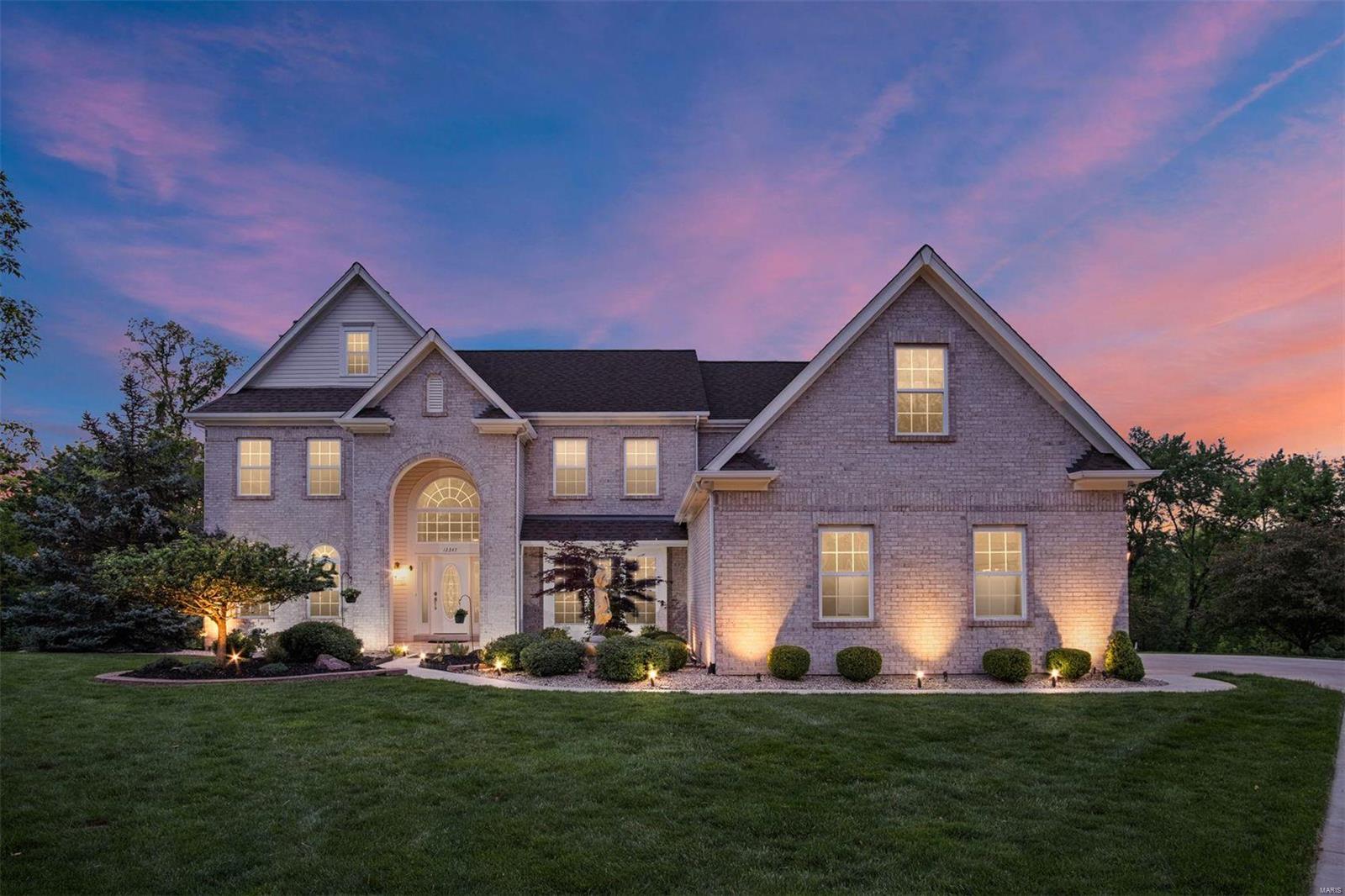 NEW PRICE for beautiful custom 5 bed, 5.5 bath home in Creve Coeur.  This home sits on private .5 acre wooded lot on cul-de-sac with almost 6,000 sq ft of living space.  The 2-story foyer, curved arch openings, custom moldings in office, dining room, and living room exude the home's detail.  Kitchen features a center island, gas cooktop, premium cabinetry, and SS appliances. Sunroom opens to large cedar deck overlooking private yard with plenty of space for pool. Main floor in-law/nanny suite with private bath is off the gourmet kitchen. 2nd level boasts sizable primary bedroom with 11-ft vaulted ceiling leading to bath with walk-in shower, enclosed toilet, Whirlpool tub, adjoining his & her vanities & walk-in closet. The loft, 2nd office/media/game area, & 3 additional bedrooms-1 en suite & Jack-n-Jill bath - all with walk-in closets complete the 2nd level. The walkout LL welcomes you to the living room, exercise room, and a state of the art theater room. This custom home has it all.