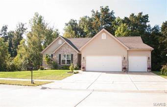 Outstanding 2100+ sq. ft. ranch home in Westlake Subdivision! Bright and open with 3 (possibly 4) bedrooms, 2 1/2 baths, Office/Den, Great Room w/lots of natural light, Kitchen and Dining Room combo with French doors that lead to an inviting deck on a pretty lot with private rear and side yards that adjoin common area on a quiet cul-de-sac. This split floor plan offers an over sized 3 car garage, energy efficient package,Tankless H/W heater, vaulted ceilings, central vac, granite countertops and more! The wood floors are a standout. The interior is bright and welcoming-perfect for entertaining or enjoying some quiet time in front of the gas fireplace. Some finish in the lower level that includes a cedar-lined closet. There is a Community Clubhouse, Pool and level sidewalks for walks or runs. Awesome location just minutes from Hwy 44, Shaw Nature Reserve, and Purina Farms.