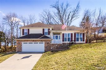 Stunning home with many custom details is move-in ready. Three bedroom, 2.5 bath home features a warm an inviting main floor / open design.  The kitchen boasts a breakfast bar w/ stacked rock surround, built in microwave, upgraded cabinetry with crown molding, stunning backsplash.  Kitchen appliances are to stay.  Main floor laundry and half bath are conveniently located.  The master bedroom suite features walk-in closets, double bowl vanity and expanded shower. The lower level rec room would also make a great office, play room or media room.  The expanded patio perfect for entertaining family and friends, beautifully landscaped, and nice backyard that backs to trees!  Located at the end of a cul-de-sac with some amazing views, this family friendly home is ready for it's new owners.

New Haven is an easy commute down scenic Hwy 100, offers shopping and healthcare, and the New Haven School District was honored to be selected a Blue Ribbon School.