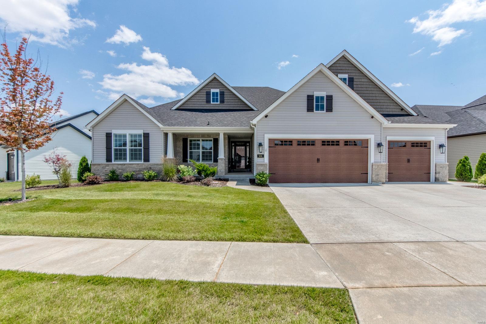 **Exceptional 2yr old Lombardo built home w/4300+ sq feet includes soaring 11ft ceilings, custom millwork, real hardwood floors, 3 FP’s & dedicated private office. At the heart of the home is a gorgeous kitchen ready to serve any size gathering! You’ll Love this space w/timeless white cabinets, huge island, 3 ovens, 6 burner gas range & walk-in pantry! The hearth room leads to a screened porch complete w/a fireplace & views of Busch Conservation Area. The owner’s suite has its own separate wing w/luxury bath & 2 walk-in closets. A split bedroom plan includes 2 additional bedrooms on the main floor & 2 in the lower level offering flexible space for family & overnight guests. How would you use the walk-out lower level: in-law-suite, sports bar, hosting movie/game night? Why build when you can save time & money! Contact agent for full list of upgrades & custom features.