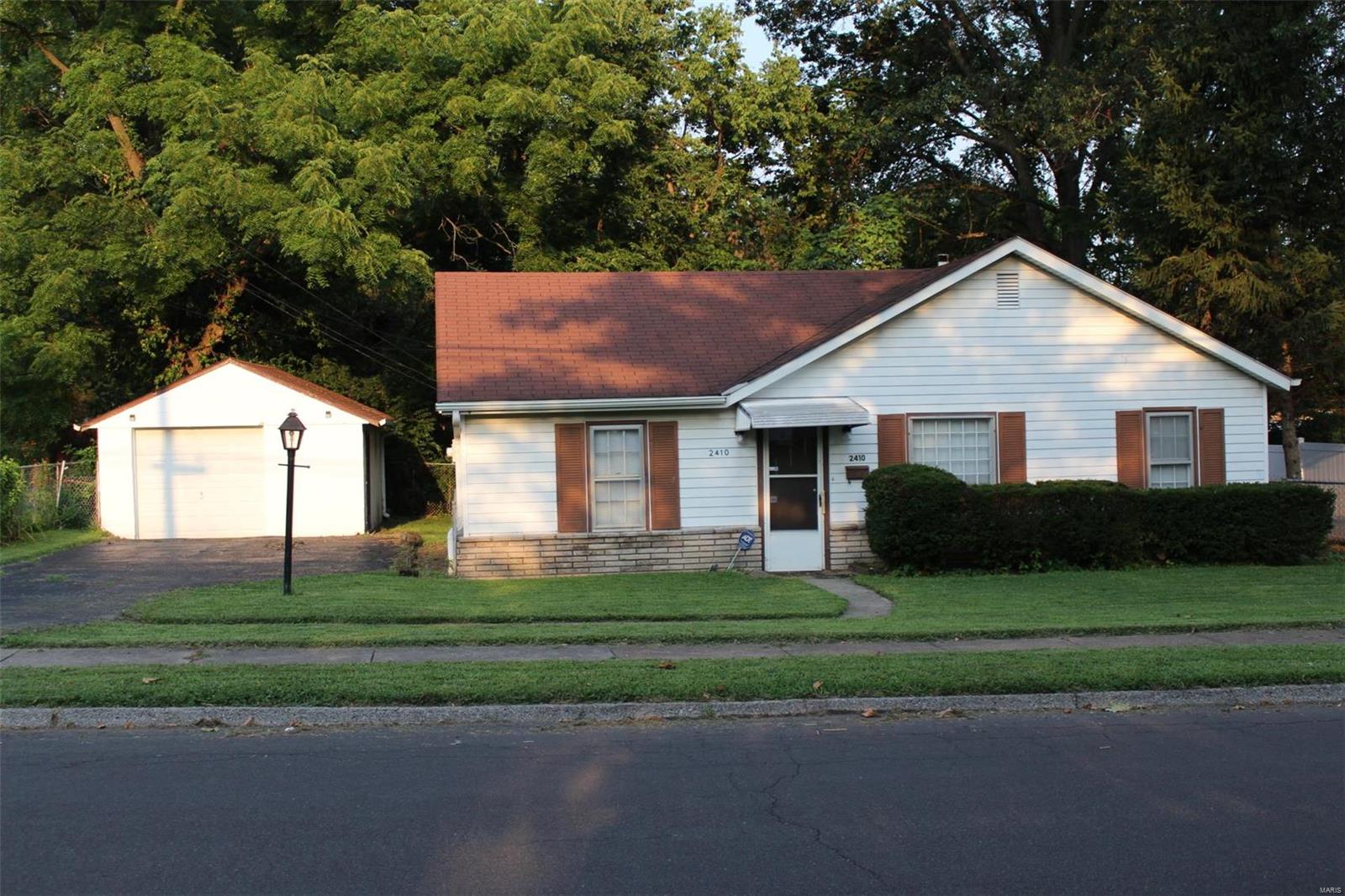 This cute 2 bedroom 1 full bath ranch home in Overland has a lot to offer. An open floor plan adds to the spacious feeling of the house. Entering into the living room you will be lead through an opening taking you into the breakfast room that opens to the kitchen. Walk down the hall and you will find 2 nice size bedrooms and a full hall bath. Step out of the laundry room and onto the screened in porch, on the rear of this cute home, and enjoy your level fenced yard. Washer, Dryer and Refrigerator stay with house in as is condition.  A one car detached garage and the extra-long driveway provides off street parking for up to 4 vehicles.  This home is being sold as is. Needs work but has great potential.  Close to transportation and shopping. Additional Rooms: Mud Room