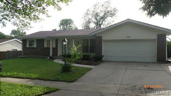 OUTSTANDING OPPORTUNITY!!! This three bedroom ranch has TONS to offer!  Open living room and dining room, and tiled kitchen and baths! Partially finished lower level has recreational room with fireplace, two-car attached garage, and rear patio for entertaining!  And - it isn't too late to enjoy the in-ground pool!  Bring your workboots and make it shine!